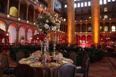 Tall floral arrangements decked several tables.