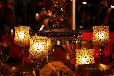 The settings evoked a Turkish feel, with lanterns and mosaic glass candleholders.