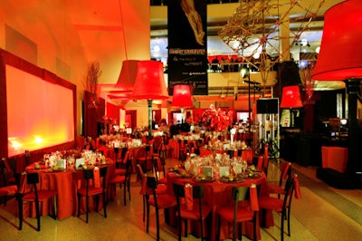 Giant lamps illuminated dinner tables.