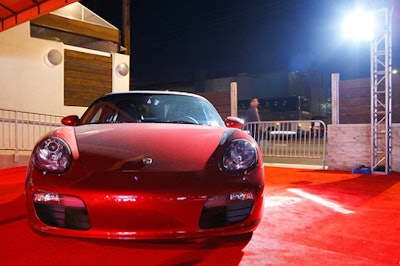 Porsche parked its cars on the sprawling red carpet covering Area's parking lot.