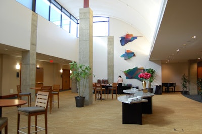 The ballroom's adjacent atrium features a clean and modern design.