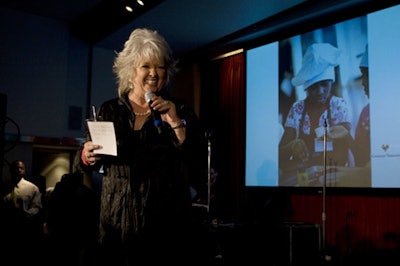 After-party host Paula Deen introduced John Legend before his nearly hourlong set.