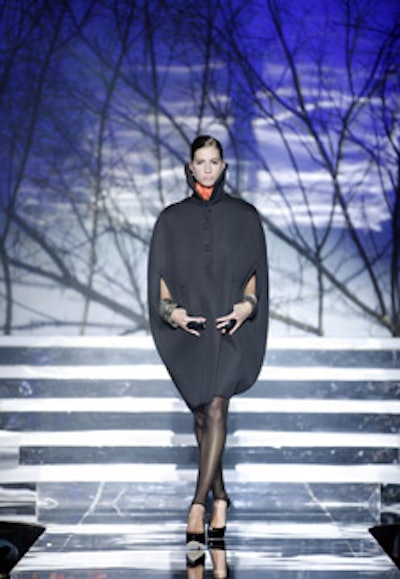 Models walked a 42-foot-long mirrored runway at the Greta Constantine show.
