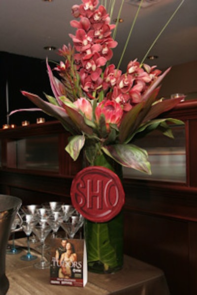 Floral arrangements featured a red wax 'Sho' logo.