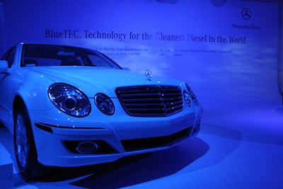 Aiming to keep the event low on conspicuous product promotion, Mercedes-Benz showed off two BlueTEC cars in a corner of the venue flooded with blue light and cloud projections.