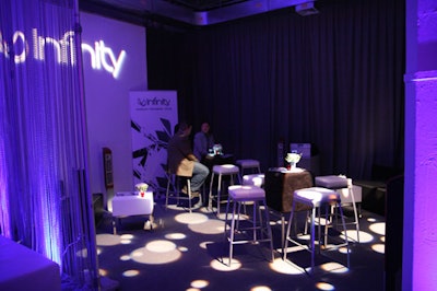 The production team created niches for the event sponsors that were more subtle in color and lighting, including a small space for Infinity Systems.