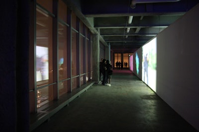 On one side of the venue, the production team projected images of more artwork, which was reflected in the floor-to-ceiling windows.