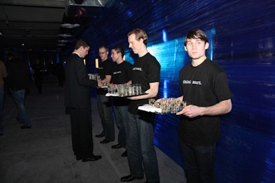 Caterwaiters in black T-shirts that bore the words 'Think Smart' passed sweets and hors d'oeuvres as well as specialty drinks like the Apple Kuchen (apple schnapps and Goldschlager).