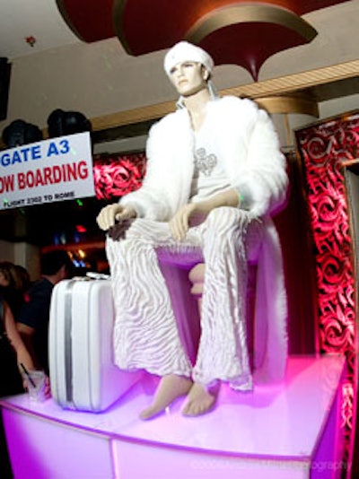 Elaborately dressed, jet-setting mannequins greeted guests upon entry to the boarding gates.