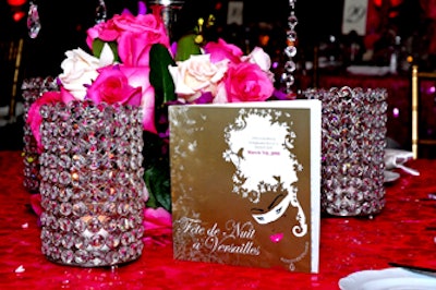 Centerpieces of roses and bejeweled candleholders decorated the tables at the 'Fete De Nuit a Versailles' event.