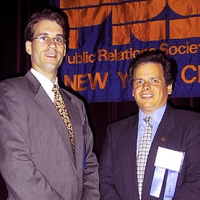 Adam Wolf, director of public relations for Infogate and one of PRSA's Big Apple awards judges, posed with Michael Rinaldo, senior vice president and partner at Fleishman-Hillard and president-elect of PRSA's New York chapter.