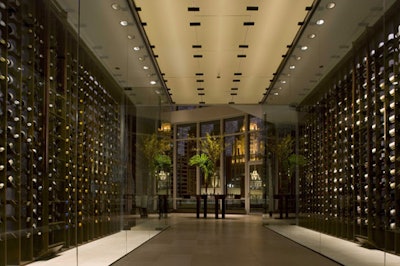 A 900-bottle glass-enclosed wine gallery lines the entrance to Sixteen's dining room.
