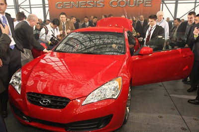 The stage of Hyundai's press conference became the site of a cocktail reception that, aside from providing drinks, food, and music from the band Joe Rockstar, allowed journalists to inspect the vehicles.