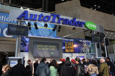 Visitors to AutoTrader.com's booth could sign up to take part in a quiz show. Host Andrew McMasters picked three constestants every hour.