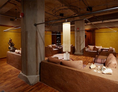 Guests can relax in a meditation area just beyond the stone-lined hallway.