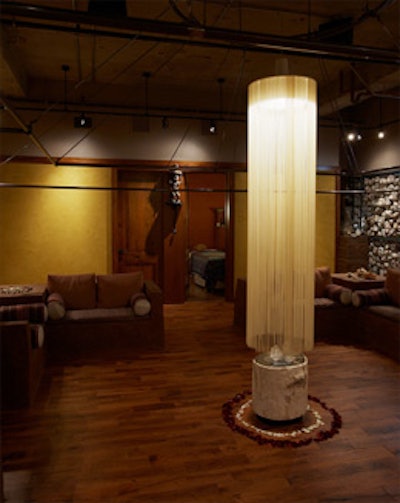At the center of the meditation room, energy-channeling crystals perch atop a pedestal made of petrified wood.
