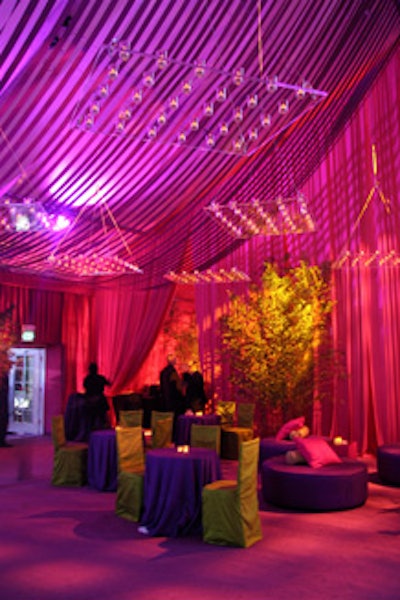 For Elton John's annual Oscar-night AIDS fund-raising gala in Los Angeles, Antony Todd used strips of ribbon to create a curved ceiling.