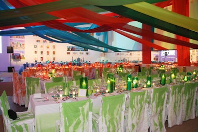 For a dinner celebrating the 30th anniversary of arts nonprofit Studio in a School in New York, Van Wyck & Van Wyck hung colorful, crisscrossed swags of silk over dining tables.