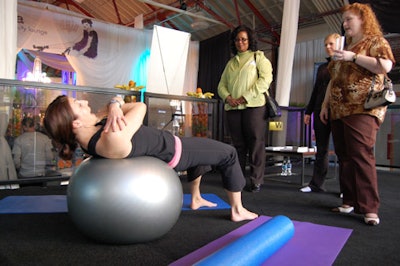 Yoga and Pilates teacher Annabel Fitzsimmons demonstrated exercises at the 'Get Healthy' station.