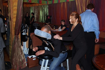 Massage therapists offered neck and shoulder massages to guests.