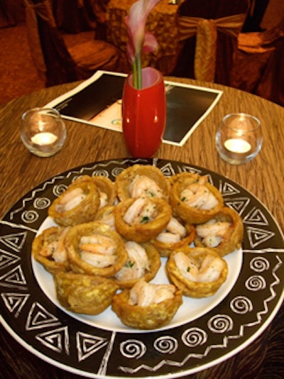 One of the many delicious hors d'oeuvres served was cooked shrimp in a fried plantain bowl.