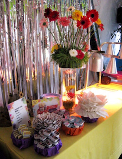Brightly colored linens and flowers topped tables at the after-party.