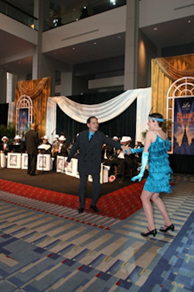 A swing band and dancing flappers performed in the convention center's front hall.