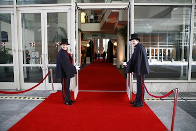 Staffers in era-appropriate getups welcomed guests on the red carpet.