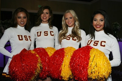 USC Cheerleaders sold raffle tickets to guests.