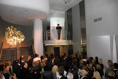 Dismero owner and designer Andy D'Auria welcomed guests from the theater's balcony.