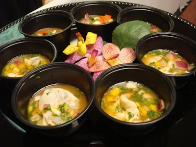 Caterwaiters served shrimp ceviche cups to guests upon entry.