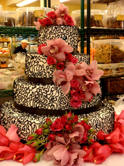 The grocer created a decadent wedding cake for the wedding vignette.