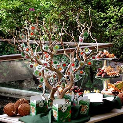 Lollipop trees by Musters & Company loomed over a table of candy and cookies.