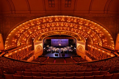 The stage of the Auditorium Theatre presented a space that fit event chair Diana Martinez's needs for the gala's sit-down dinner: She wanted something elegant and unique.