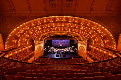 The stage of the Auditorium Theatre presented a space that fit event chair Diana Martinez's needs for the gala's sit-down dinner: She wanted something elegant and unique.