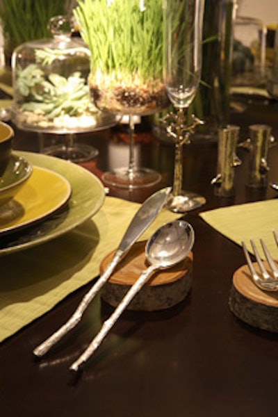 The designers for the Allsteel/HOK table used log sections to prop up flatware.
