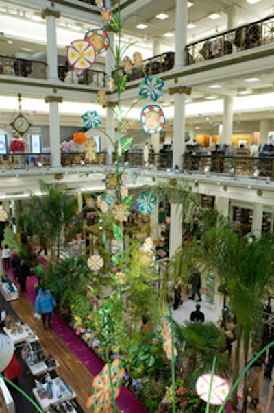 The store's first floor was decked with a colorful carpet, plants, flowers, and artwork.