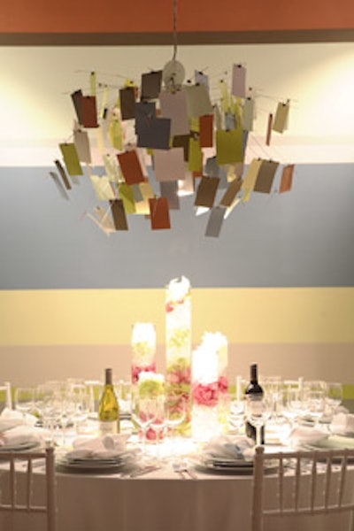 Vicente Wolf's table for The New York Times had a chandelier embellished with paint swatches.