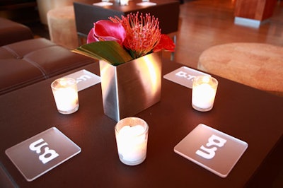 Branded coasters could be spotted throughout the space.