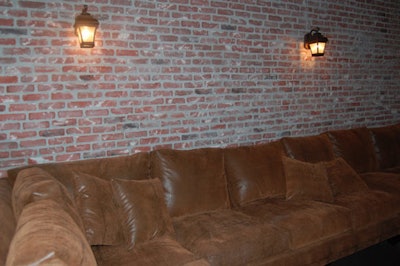 One of the private rooms has a giant rustic leather sectional.