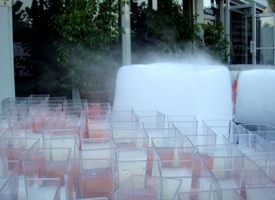 Aaron's Catering poured premade drink mixes into blocks of dry ice to create unique frozen shots.