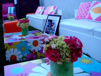 Pink and green floral arrangements enhanced the spring space.