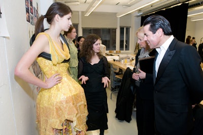 Judges including Bebe president and C.E.O. Greg Scott listened to the inspiration behind student designers' creations. SAIC senior Jessica Grate said that her work was inspired by the 'chatoic and complex beauty' of India.