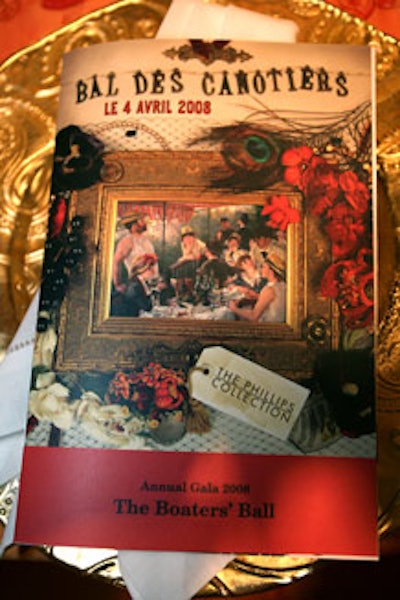 The evening's French theme took a cue from the collection's famed canvas: Renoir's 'Luncheon of the Boating Party,' pictured here on the event's program.