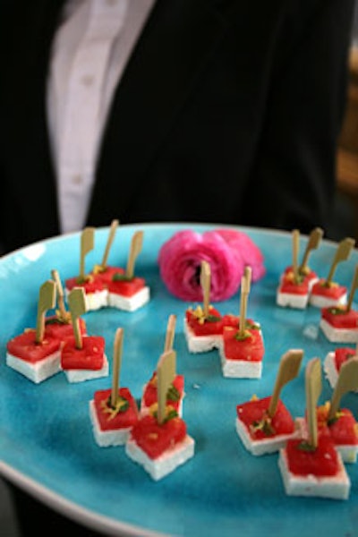 For the French-inspired spring menu from Occasions Caterers, hors d'oeuvres included skewered watermelon and feta bites.