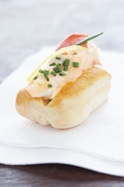 Poached Maine lobster with lemon and chives on a homemade bun, from Taste Caterers in New York