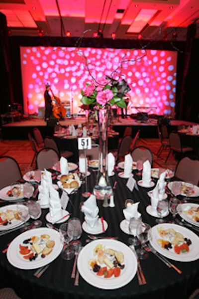 Frost Lighting created a pink color scheme for dinner in the hotel's ballroom.