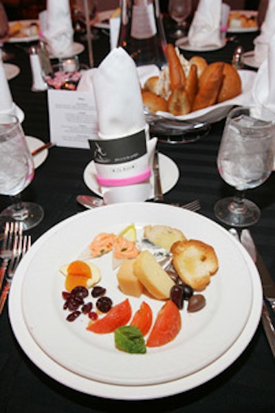 The first course included assorted cheeses, endive tips with sun-dried tomato mousse, marinated olives, dried fruits, and crostinis.