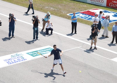 ATP Tour player David Nalbandian and Indy driver Helio Castroneves shared each other's passions at Homestead Miami Speedway, as the two played a competitive set across the track's finish line and Nalbandian got behind the wheel to cruise around the track.