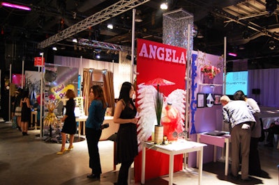 Visual merchandising arts students displayed their portfolios in an area adjacent to the runway.